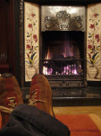 Warming feet by the fire